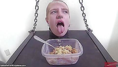 Sexy young blonde model shows off her slave