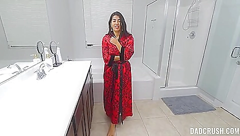 Sexy brunette hair shows off her feet in the park